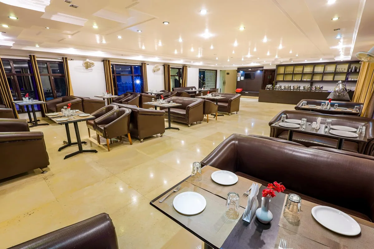 Elegant Restaurant at Vaapi Comfort Inn serving Indian and Continental cuisine